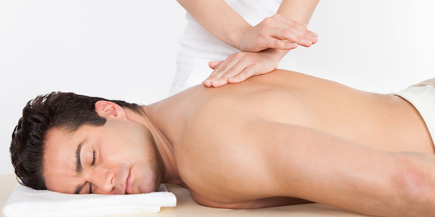 patient receiving massage in San Jose